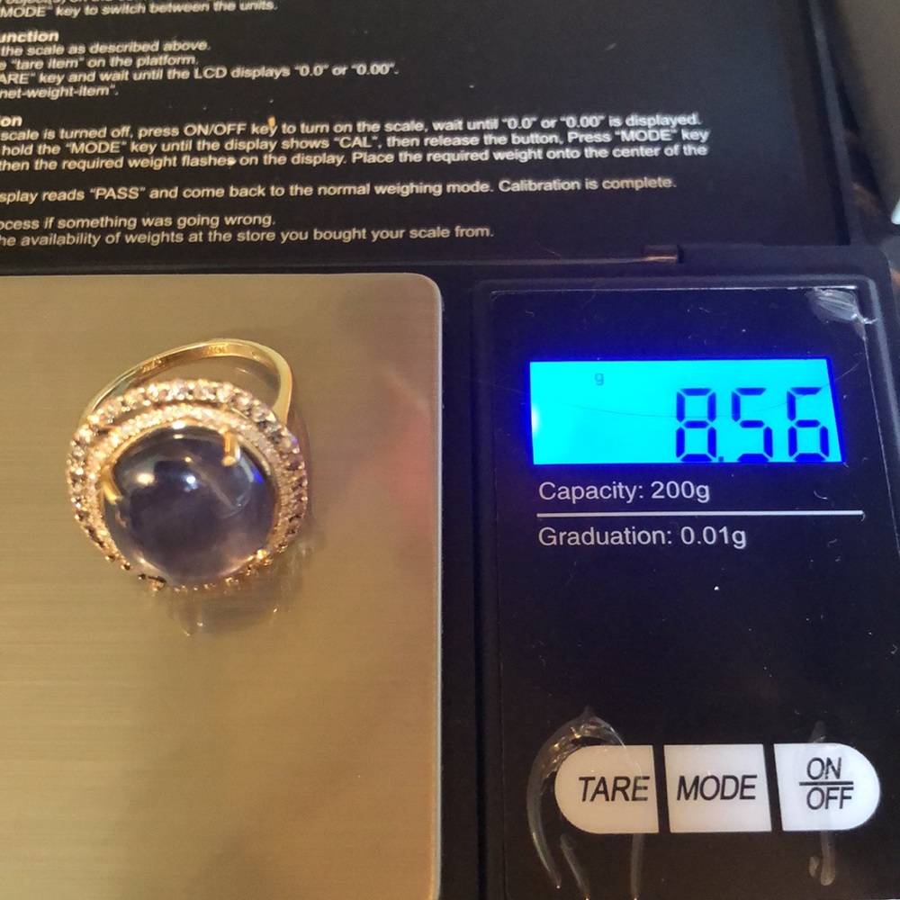 19 ct Star Sapphire surrounded by Diamonds in gold - Picture 15 of 15
